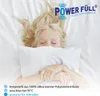 A young girl is sleeping on a white bed, holding a white pillow. Produktbild-Vorschau