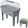 A raised garden bed with a clear lid, shown from a slightly elevated angle. Náhľad obrázku produktu
