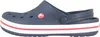 A side view of a single blue Crocband Clog shoe with white and red stripes on the sole. Anteprima dell’immagine prodotto