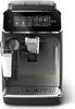 A fully automatic espresso machine with a glass of milk next to it. Produktbild-Vorschau
