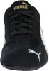 A close-up, front-facing view of a black Puma sneaker with white accents and a gold Puma logo on the tongue. Produktbild-Vorschau