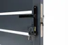 A close-up view of a dark gray sliding gate with a black handle and a set of keys attached to the lock. Produktbild-Vorschau
