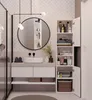 A modern bathroom vanity with a sink, mirror, and storage cabinet. Produktbild-Vorschau