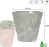 A close-up of a gray planter with a textured, concrete-like finish, shown next to a pink planter with a succulent plant. Dimensions and capacity are indicated with text and icons. Produktbild-Vorschau