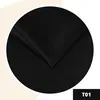 A close-up of black fabric folded to show texture and depth, presented within a circular frame against a light beige and white background. Anteprima dell’immagine prodotto