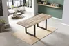 A dining table in a modern living room setting. Produktbild-Vorschau