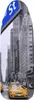 A street scene in New York City with yellow taxis and tall buildings, overlaid with a street sign. Podgląd zdjęcia produktu