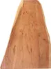 A close-up view of a wooden tabletop with a live edge. Produktbild-Vorschau