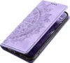 A purple flip phone case with a mandala design is shown open, revealing a phone screen. Produktbild-Vorschau
