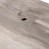 Close-up of a wooden surface with a hole. Produktbild-Vorschau