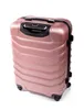A rose gold suitcase is shown against a white background. Náhled obrázku produktu