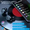 A pair of black wireless earbuds are placed on a surface resembling a vinyl record, with a smartphone displaying app icons and text in the background. Text overlays describe voice assistant commands. Produktbild-Vorschau