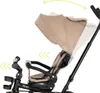 Close-up of a child's tricycle seat and canopy, with arrows indicating adjustability. Produktbild-Vorschau