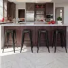 A modern kitchen island with four black metal bar stools. Anteprima dell’immagine prodotto