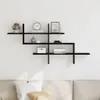 A black wooden wall shelf unit is mounted on a white wall above a sofa. Podgląd zdjęcia produktu