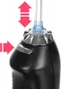 Close-up of the top part of a black dental irrigator, showing a silver dial and a clear tube with a blue connector. Náhľad obrázku produktu