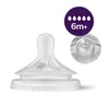 A close-up studio shot of a baby bottle nipple on a white background. Voir les images du produit