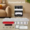A collection of robot vacuum accessories is displayed in front of a couch and a robot vacuum docking station. Produktbild-Vorschau