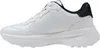 A side view of a white Guess sneaker with a black heel accent. Produktbild-Vorschau