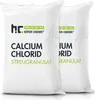 Two white bags of calcium chloride streugranulat. Produktbild-Vorschau
