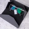 A pair of glasses in a black case with a silica gel packet. Produktbild-Vorschau