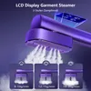 A close-up shot of a purple garment steamer with steam being emitted, showcasing different steam settings. Produktbild-Vorschau