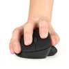 A hand holding a black vertical mouse. Voir les images du produit
