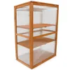 A wooden greenhouse with clear plastic panels and three shelves, shown against a white background. Produktbild-Vorschau