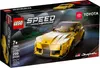 The image shows the front of a LEGO Speed Champions Toyota GR Supra building toy box, with the toy car prominently displayed on a race track background. Náhled obrázku produktu