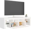A white TV stand with a television on top, showcasing some decorative items on the shelves. Anteprima dell’immagine prodotto