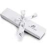 A white gift box with a ribbon tied around it, featuring the brand's logo and name. Anteprima dell’immagine prodotto