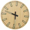 A close-up view of a wooden wall clock with black hands and luminous hour markers. Náhled obrázku produktu