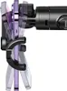 A close-up side view of a black selfie stick holding a purple smartphone. Náhled obrázku produktu