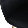 A close-up view of the black velvet upholstery of a chair, showing the stitching detail and a hint of a gold-colored leg. Náhľad obrázku produktu