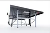 The underside of a table tennis table, tilted upwards, with its legs and wheels visible. Produktbild-Vorschau