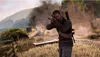 A man aims a rifle in a battlefield setting with smoke and fire in the background. Podgląd zdjęcia produktu