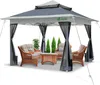 A gray pop-up gazebo with mesh sides and wicker furniture inside, set against a white background. Voir les images du produit