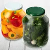 Two jars of preserved food, one with peppers and the other with pickles, are displayed on a wooden surface. Podgląd zdjęcia produktu
