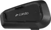 A black Cardo Spirit HD Duo intercom device for motorcycle helmets, shown from a diagonal angle. Produktbild-Vorschau