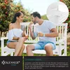 A couple enjoying breakfast on a white garden bench outdoors. Produktbild-Vorschau