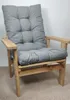 A close-up view of a grey cushioned wooden garden chair. Produktbild-Vorschau