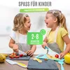 Two young girls are happily cutting fruit with child-safe knives and cutting boards. Produktbild-Vorschau