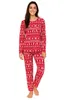 A woman is modeling a red and white patterned pajama set. Produktbild-Vorschau