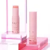 Two pink Kahi Wrinkle Bounce Multi Balm sticks are displayed on pink acrylic blocks against a white background. Náhled obrázku produktu