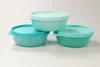 Three Tupperware containers are stacked and arranged on a plain background. Anteprima dell’immagine prodotto