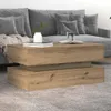 A modern living room scene with a couch and coffee table. Náhľad obrázku produktu