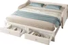 A white daybed with two pillows and a blue throw blanket, shown with two open drawers underneath containing items. Náhled obrázku produktu