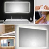 A collage of images showing a bathroom vanity set with mirrors, sinks, and a cabinet, along with close-ups of the touch controls and hands interacting with them. Produktbild-Vorschau