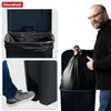 A man is showing a large trash bag he has removed from a trash can, and other images show how to use the trash can. Náhled obrázku produktu