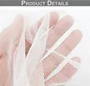 A close-up view of a hand wearing a white mesh fabric, showing the texture and pattern of the material. Produktbild-Vorschau